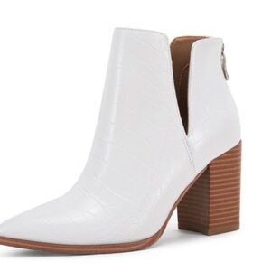 Woman’s stacked heel fake leather booties